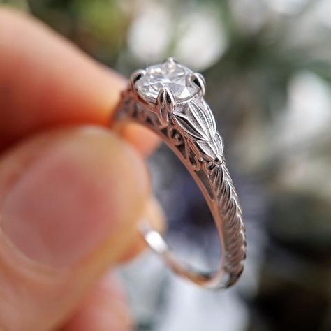 Filigree and florals? Yes, please! I love designing custom engagement  rings, and vintage-inspired styles are some of my absolute favorites.  Interested in your own bespoke engagement ring? Searching for an  alternative engagement ring? Let's make it together! Fill out my Custom Design Form to get started. www.christinealaniz.com Vintage Diamond Filigree Promise Ring, Vintage Filigree Promise Ring, Vintage Filigree Ring With Brilliant Cut As Gift, Vintage Diamond White Filigree Promise Ring, Vintage Filigree Promise Ring In Diamond White, Bohemian Engagement Ring, Antique Emerald Engagement Ring, Forest Nymph, Pave Wedding Rings