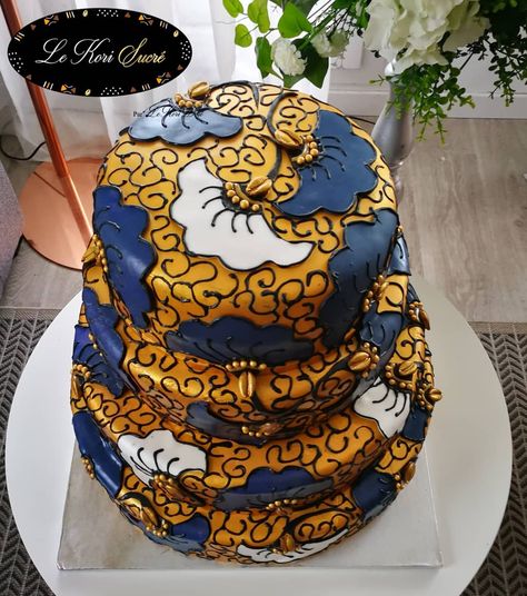 African print #cake #africanprintcake #africanprint #african #waxelie African Print Cake, Modern African Print Dresses, Africa Cake, African Wedding Cakes, African Cake, African Inspired Wedding, Traditional Wedding Cakes, Wedding Cake Roses, African Traditional Wedding