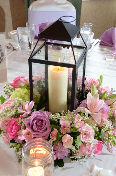 Candle Centerpiece! #wedding #centerpiece #candlecenterpiece #candle #weddingflowers @Stellas Florist Candle Centerpiece Wedding, Lantern Flowers, Wedding Table Deco, Silver Weddings, Flower Arragement, Wedding Lantern, Candle Centerpiece, Lantern Centerpieces, Centerpiece Wedding