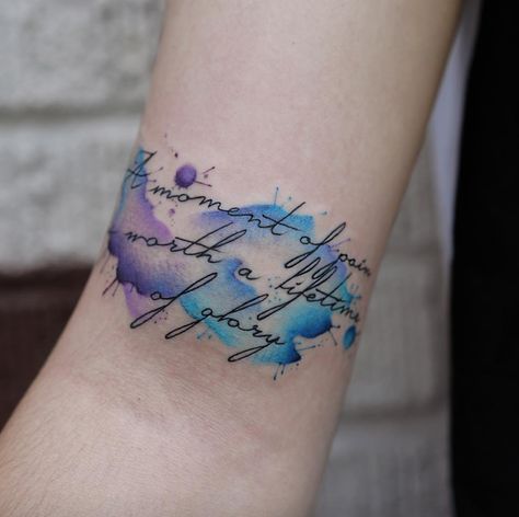 Words of wisdom make this pretty watercolor tattoo even more special. Tattoos Pulseras, New School Tattoos, Wörter Tattoos, Unusual Tattoo, Tattoo Background, Small Tattoos With Meaning, Pretty Watercolor, Cross Tattoo Designs, Best Tattoos For Women