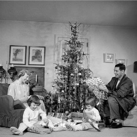 18+Vintage+Photos+That+Will+Make+You+Nostalgic+For+Christmases+Past  - CountryLiving.com Christmas Tree Canvas Art, Vintage Foto's, Christmas Tree Canvas, Vintage Christmas Photos, 1950s Christmas, Swedish Christmas, Christmas Family Photos, Judy Garland, Nordic Christmas