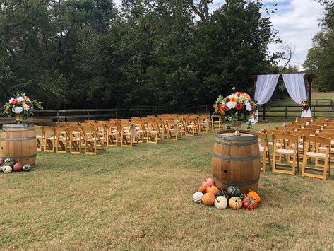 Fall colors wedding aisle decor Fall Backyard Wedding Ceremony, Fall Lake Wedding Ideas Decor, Fall Outdoor Ceremony Decor, Pumpkin Aisle Wedding, Fall Wedding Aisle Decorations Outdoor, Fall Aisle Decorations Wedding, Fall Wedding Aisle Decorations, Fall Wedding Aisle Decor, Fall Outdoor Ceremony