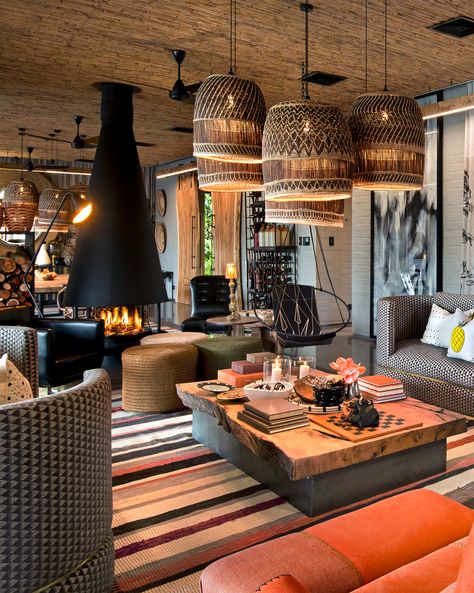 The six luxurious and carefully designed safari lodges of the andBeyond Phinda Private Game Reserve are havens of sophistication and style in the pristine bush surroundings of South Africa’s lush Maputaland region. #southafricalodges #southafricaluxurylodge #southafricalodgedecor #southafricabesthotels #africaluxurytravel #AfricaLodgeLuxury #africaluxurysafari #AfricaHoneymoon #Safarilodge #luxurytravelafrica #africavacation #bestsafarilodges #safarilodgearchitecture #AfricaInterior Game Lodge Decor South Africa, Luxury Safari Lodge Interior, Rustic Lodge Dining Room, African Lodge Design, Safari Lodge Design, Game Lodge Decor, Safari Interior Design, Safari Style Interior, Safari Lodge Decor