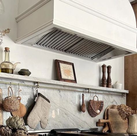 MMI Design on Instagram: "My Weekend Inspiration! #weekendinspo 
#slabshelf #kitchenshelf 

With my inspo post today, I am including a photo of my kitchen. We installed a shelf over the range hood, and it has made all the difference. It is great when you are cooking, and it holds my things that truly make me happy in a kitchen - art, bowls, grinders, utensils, and oils. What do you love to display in your kitchen?

Pic 1: Design and 📷 by: @brepurposed 

Pic 2 and 3: Design and 📷 by: @carlaypage

Pic 4: Design @blakesldn 📷 by: @82mmphotography Styling @kerri.lipsitz

Pic 5: Design @duststory 📷 by: @inigo.house Kitchen build @plainenglishdesign

Pic 6: Design @mmi_design 📷 by: @kerrykirkphoto Styling @curiousdetails
____________________________________⁠
👉⁠
Follow @mmi_design for more i Over Oven Decor, Above Oven Shelf, Over The Range Hood, Kitchen Cooktop, Weekend Inspiration, Marble Shelf, Farmhouse Kitchens, Beach House Kitchens, My Things