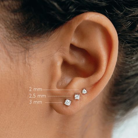 14k white gold stud earrings featuring brilliant lab grown diamonds in a prong setting. Diamonds measure at 2mm. A classic style perfect for everyday wear.  Total carat weight of diamond: 0.034 cts  Note: buying a "Single" means you are buying a single earring, not a pair! Please choose "Pair" in order to buy a pair. It will add 2 x single earrings to your cart.  Quantity: Single, Pair Puffy Heart Necklace, Gold Diamond Stud Earrings, Gold Diamond Earrings Studs, White Gold Earrings Studs, White Gold Studs, London Blue Topaz Ring, Stacked Jewelry, Gold Stud Earrings, Ear Piercing