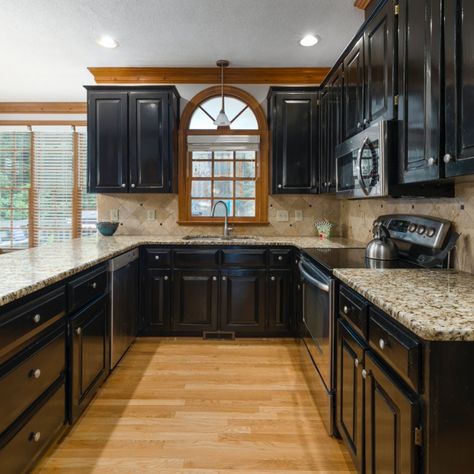 Mood -- are you feeling it? 🖤 Do you enjoy the contrast the black gives to the earthy elements? #blackkitchen #design #kitchendesign #kitcheninspo #interiordesign #remodel #home #renovation #rustic #modern #soulful #chic #texture #designinspiration #inspotoyourhome #inspo #makehomeyours #kitchenisland #makehomeyourhaven #makehomematter #kitchengoals #dreamkitchen #naturalstone #designmyspace #storyofmyhome #fearlessinteriors #glowupmypad #myrevampreveal #kitchenlove Black Kitchen Cabinets With Brown Granite, Kitchen Cabinets With Brown Granite, Cabinets With Brown Granite, Black Cabinets Kitchen, Exterior Kitchen Doors, Modern Kitchen Cabinet Design Ideas, Brown Granite Countertops, Kitchen Brown, Interesting Decor