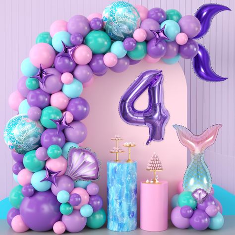 PRICES MAY VARY. Mermaid Party Balloon Arch: You will receive balloons of various colors and sizes to make a mermaid themed balloon arch, including 100 pieces of latex balloons (12" balloon x25, 10" balloon x25, 5" balloon x50), round foil balloon x2 , shell balloon x2, mermaid tail balloon x1, purple tail balloon x2, large number balloon x1, star balloon x5. Easy to Assemble: Our kit includes balloon chain, dot glue, and balloon tie tool to make assembling the balloon arch simple. Whether you w Mermaid Birthday Party Cakes, Mermaid Balloon Arch, Mermaid Tail Balloon, Birthday Party Purple, Little Mermaid Birthday Cake, Decorations For Birthday Party, Mermaid Decorations, Large Number Balloons, Mermaid Balloons