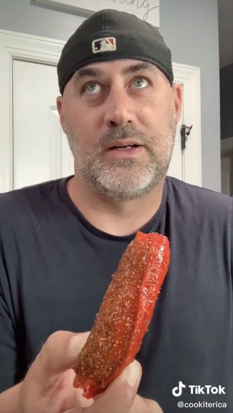 Pickles wrapped in Fruit-Roll Ups are the hottest new food trend! Pickle With Fruit Roll Up, Pickles Wrapped In Fruit Roll Up, Pickle Wrapped In Fruit Roll Up, Pickle And Fruit Roll Up, Watermelon Wrapped In Fruit Roll Up, Candy Covered Pickles, Pickle Fruit Roll Up Chamoy, Fruit Roll Up Pickle, Flavored Pickles