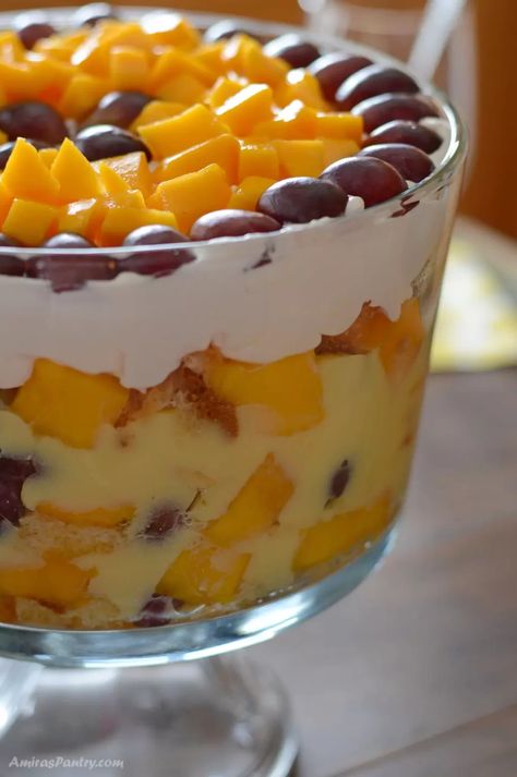 A close up side look at a fruit trifle. Summer Trifle Desserts, Fruit Trifle Recipes, Summer Trifle, Trifle Dessert Recipes, Easy Summer Dessert Recipes, Fruit Trifle, Easy Custard, Tropical Desserts, Coconut Pudding