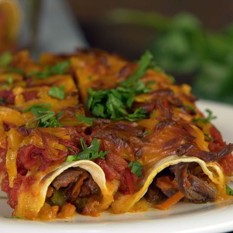 Shreded Beef Enchiladas | Tastemade Fun Food Facts, Shredded Beef Enchiladas, Best Enchiladas, Tastemade Recipes, Beef Enchiladas, Shredded Beef, Food Facts, Food Trends, Game Day Food