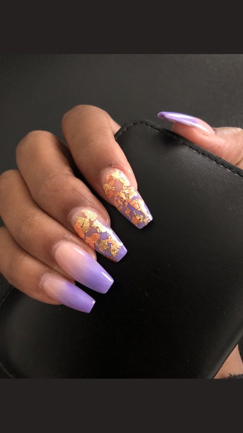 Purple coffin acrylic nails with gold flakes Acrylic Nails Coffin Gold Flakes, Baddie Nails Ideas, Coffin Gold Flake Nails, Purple Nails With Gold Foil, Purple Marble Nails With Gold Flakes, Purple Nails Gold Flakes, Nails Ideas Autumn, Nails With Gold Flakes, Nail Long