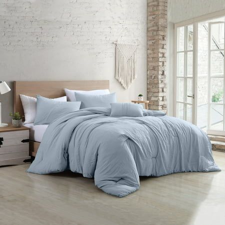 Soft texture and easy living are what we crave these days; a relaxed atmosphere allows us to take a deep breath! The Beck adult unisex bedding set is exactly what you need! This set includes one pre-washed comforter, 2 pillow shams, and a decorative pillow. The four-piece bedding set is packaged in a reusable self-bag, of the same material, that is usable as a tote! The 100% pre-washed microfiber is machine washable and dryer-safe for easy care. This set is perfect for Size: Full/Queen.  Color: Blue. Linen Comforter, Blue Comforter, Future Room, Twin Comforter, Cotton Bedding Sets, King Comforter Sets, Comfortable Bedroom, Queen Comforter Sets, Bed Sets