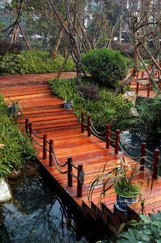 If you have a pond or a creek in your yard you might need a well-built bridge. Browse throughout these neat Garden Bridge Designs we've compiled for you. Garden Bridge Design, Backyard Bridges, Pond Bridge, Mini Zen Garden, Zen Garden Design, Japanese Garden Design, Wooden Bridge, Small Garden Design, Cool Ideas