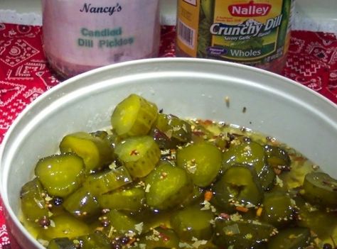 I received this recipe from a lady at church, a couple months ago. I am now on my 6 th jar!!! ..11-5-11 They go fast. Now I watch for pickles to go on sale, and buy a couple. Everybody love them... Picture shows what happens if you forget to tie the spices.. my bo bo. Hey I'm not perfect!...lol They still taste great! Pepper Pickles, Spicy Pickle, Cajun Christmas, Pickle Recipes Homemade, Pickle Vodka, Dill Pickle Recipe, Vegetable Appetizers, Appetizer Tray, Spicy Pickles