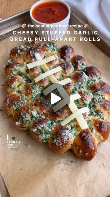 Maddie Vock on Instagram: "don’t you dare show up to the super bowl watch party empty handed 😤 the snacks are the best part!! and these football-shaped cheesy stuffed garlic bread rolls are quite literally the most addicting game day appetizer in existence 🧄🌱 they’re made with some basic store-bought ingredients like pizza dough, mozzarella cheese sticks & a simple garlic herb butter brushed over top. so cute & delicious!! 🏈 full recipe is up on my site! i’d be so grateful if you left a rating & review after you make them 🫶 #superbowlsnacks #superbowlrecipes #gamedayrecipes #footballfood #pullapartbread #garlicbread #garlicbutter #cheesestuffed #appetizers #footballparty" Garlic Bread Rolls, Stuffed Garlic Bread, Best Superbowl Food, Football Recipes, Italian Snacks, Football Appetizers, Mozzarella Cheese Sticks, Football Ideas, Game Day Appetizers