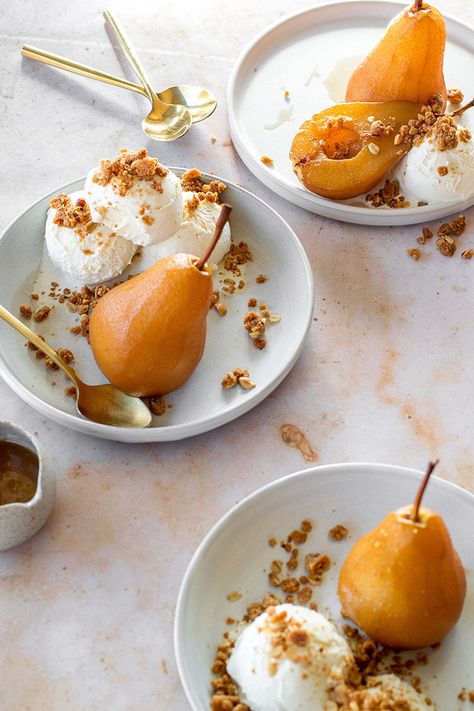 Chai-Poached Pears with Spiced Hazelnut Oat Crumble and Caramel Sauce Recipe. Delicious and shockingly easy dessert recipe for fall, Thanksgiving, or holiday parties!  #pears #poachedpears #fall #autumn #thanksgiving #dessert #caramelsauce #chai #chaispiced #oatcrumble #hazelnuts Poached Recipes, Poached Pear Dessert, Tuxedo Kitchen, Nightstand Essentials, Poached Pears Recipe, Bramble Cocktail, Dried Botanicals, Colorful House, Roasted Pear