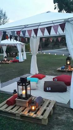 We really feel this has nailed the chillout look of a Gazebo party area - loving the simplicity of cushions bean bags and pallet used as tables We have two of these white Gazebos for hire, we even have pallets for hire, lanterns and scatter cushions. Gazebo Party, White Gazebo, Deco Champetre, Summer Garden Party, בר מצווה, 18th Birthday Party, Bean Bags, Picnic Party, Garden Parties