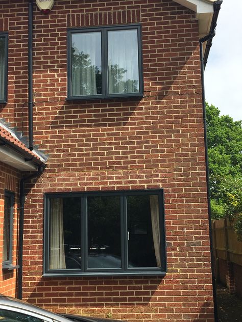 Grey Windows Exterior Red Brick, Brick House Black Trim, House Black Trim, Anthracite Grey Windows, Coolum Beach, Red Brick House Exterior, Modern Bungalow House Design, Exterior House Renovation, Weatherboard House