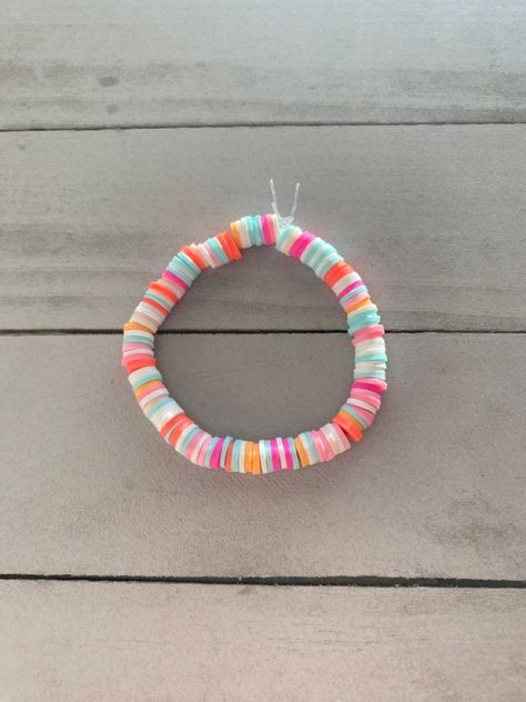 Clay Bead Bracelet Ideas Bright Colors, Flatbead Bracelets Ideas Preppy, Pink And Orange Clay Bead Bracelet, Preppy Clat Beads Bracelets, Pink And Blue Clay Bead Bracelet, Make Clay Beads, Handmade Jewelry Business, Colorful Bead Bracelets, Bracelet Stand