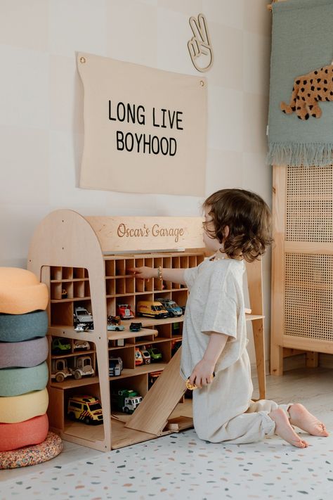 Montessori Toy Shelves 🔆 #MontessoriBed #ChildFurniture #ToddlerRoomDecor #NaturalMaterials #WoodenToys #KidsRoomInspiration #MontessoriHome #EcoFriendlyKids #ToddlerSleep #ParentingIdeas Tractor Toy Room, Storage For Toys In Kids Room, Tog Car Storage, Nursery Room Boy Pottery Barn Kids, Boy Nursery Pottery Barn Kids, Christamas List For Boys Toys, Boy Toy Storage Playroom, Toddler Toy Room Walmart, Little Boys Toy Storage