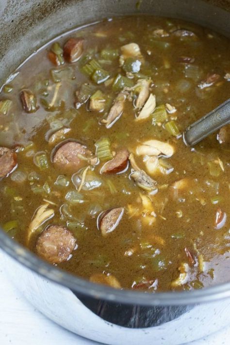 This mouth watering authentic Louisiana Chicken and Sausage Andouille Gumbo with okra, is made with a homemade roux and  holy trinity ( bell peppers, onions, and celery). Perfect for cold wintery days.   #Gumbo #easyrecipe #homemade #cajun #soup #southerncooking Gumbo With Okra, Cajun Soup, Louisiana Chicken, Andouille Sausage Gumbo, Fried Soft Shell Crab, Okra Gumbo, Chicken And Sausage Gumbo, Chicken And Sausage, Seafood Boil Recipes