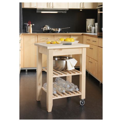 An IKEA Bekvam portable butcher block with wheels is in a clean and organized kitchen. Ikea Utility Cart, Raskog Ikea, Kitchen Utility Cart, Ikea Chest Of Drawers, Ikea Bekvam, Ikea Raskog, Storage Utility, Apartment Storage, Kitchen Trolley