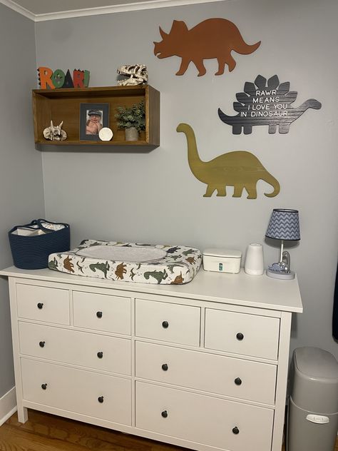 Dinosaur nursery for baby boy 🦖🦕 Some of the other dinosaur decor can be found at Hobby Lobby including; dinosaur skulls, roar sign and dinosaurs on the wall. #ad #babyboynursury #dinosaurnursery #dinosaurroom #dinosaurthemed Dinosaur Theme Nursery For Boys, Baby Boy Nursery Dinosaur Theme, Boy Nursery Dinosaur Theme, Boy Nursery Ideas Dinosaur, Dinasour Nursery Boy Ideas, Land Before Time Nursery, Dino Nursery Theme, Dinosaur Nursery Ideas, Nursery Dinosaur Theme