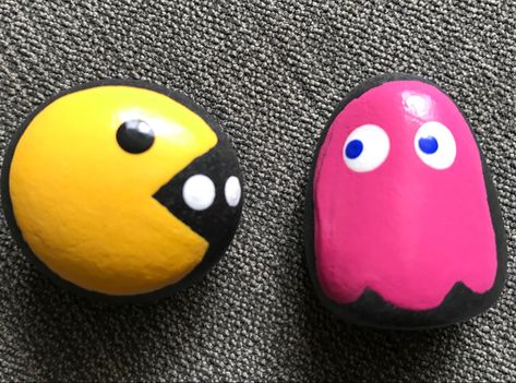 Who has pac man fever?! This cute set will take you back to the 80’s. #pacman #retro #paintedrockideas #80s Mario Bros Rock Painting, Painted Rock Tutorial Step By Step, Rainbow Rock Painting Ideas, Movie Painted Rocks, Painted Rock Characters, Rock Painting Ideas Characters, Painted Rocks Characters, Mario Painted Rocks, Funny Painted Rocks Ideas