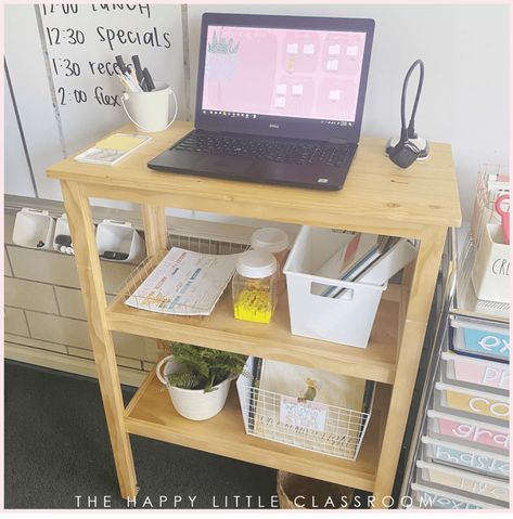 Small Group Teacher Table, 1st Grade Classroom Set Up Room Desks, Student Cubbies In Classroom, Kidney Desk Classroom, Classroom Textbook Storage Ideas, Small Teacher Desk Area, Teacher Desktop Organization, Teacher Small Group Table Organization, No Desk Classroom Teachers