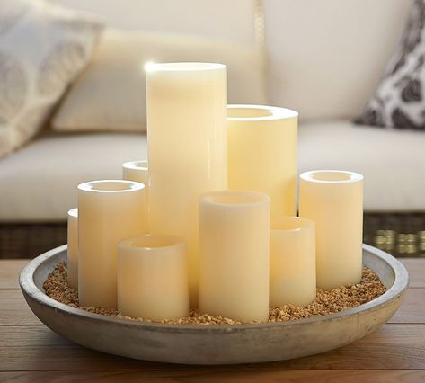 Standard Flameless Outdoor Pillar Candle - Ivory | Pottery Barn Cement Candle, Candle Arrangements, Smart Tiles, Led Pillar Candle, Candle Glow, Outdoor Candles, Candle Displays, Candle Tray, Flameless Candles