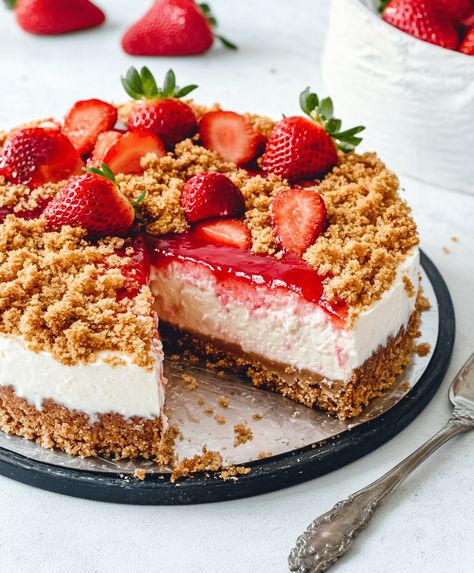 Creamy strawberry crunch cheesecake with a buttery, crunchy topping. A delightful dessert perfect for any occasion. Ready in just 4 hours! Strawberry Crunch Cheesecake, Crunch Cheesecake, Strawberry Crunch, Vanilla Whipped Cream, Freeze Dried Strawberries, Springform Pan, Creamy Cheesecake, Cheese Serving, Cheesecake Recipe