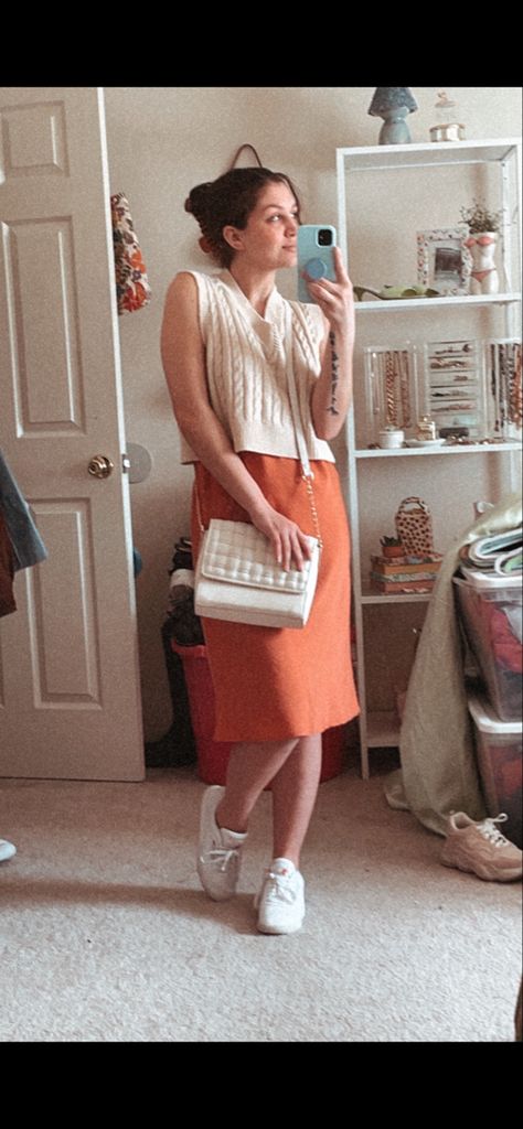 White Dress With Sweater Vest, Slicked Back Claw Clip, Dress With Sweater Vest, Slip Dress Sweater, Slip Dress With Sweater, Cream Cropped Sweater, Slip Dress White, Orange Midi Skirt, Claw Clip Hairstyle