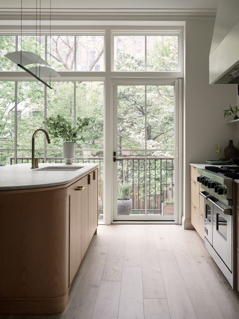 Adrienne Totoro's Brooklyn Brownstone Artfully Updated by Bangia Agostinho Brooklyn Brownstone Kitchen, Brownstone Kitchen, Brooklyn Kitchen, Front Stairs, Marvin Windows, Gas Insert, Brooklyn Brownstone, Heat Pump System, Cle Tile