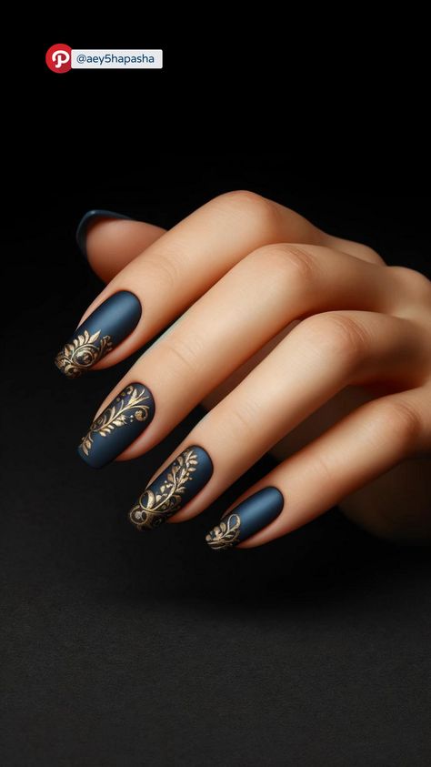 #LuxuryNails #NudeNailArt #GoldenFloralAccents #ElegantNails #NailArtDesigns #MatteNails #ChicNailArt #SophisticatedNails #NailInspiration #NailStyle #NailFashion #GlamNails #NailGoals #BeautifulNails #NailIdeas #NailTrends #NailArtLover #StylishNails #ClassyNailArt #FloralNails #NailPerfection #NailDesignInspo #NailBeauty #TrendyNails #ElegantNailArt Navy Blue And Gold Nails, Blue And Gold Nails, Sophisticated Nails, Classy Nail Art, Chic Nail Art, Elegant Nail Art, Navy Blue And Gold, Glam Nails, Elegant Nails