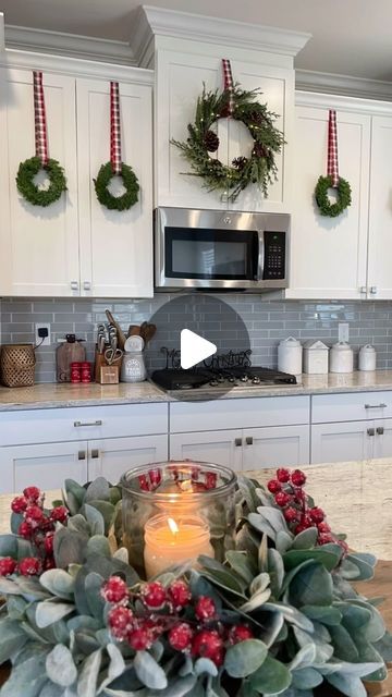 Liz Grella on Instagram: "One of the easiest ways to add cheer to your kitchen cabinets. I’ve also added just ribbon. But this is by far my favorite Christmas kitchen look.   I measure out the ribbon first-I recommend leaving it a little longer than you think you might need. I then use duct tape(yes, duct tape) on the inside of the cabinet. You can also use upside down command hooks. Duct has never damaged my cabinets. You can test it on a small area to make sure.   Comment WREATH for direct links sent directly to you. *Price for wreaths is for a set of 6!  #christmasdecor #christmasinspiration #christmasinspo #christmastime #christmasdecorating #christmaswreaths #christmaskitchen" Wreaths On Kitchen Cabinets, Michael Buble Christmas, Wreath Kitchen, Wreath Inside, Christmas Bows Diy, Christmas Tree Bows, Small Wreaths, Christmas Themes Decorations, Christmas Kitchen Decor