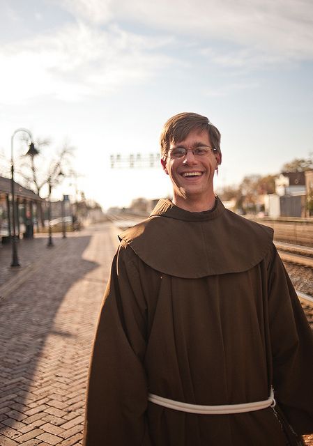 Father Jason Welle, O.F.M. waits for a train in his Franciscan habit. Simple Belt, Franciscan Friar, Look Younger, Blue Line, A Train, Nun Dress, Google Images, Ruffle Blouse, Train