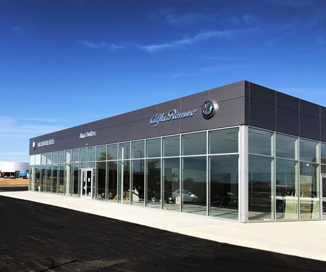 Alfa Romeo, Maserati dealership opens | 40 South News Car Dealership Design Exterior, Car Dealership Design, Car Showroom Architecture, Automotive Showroom, Car Yard, Car Showroom Design, Commercial Design Exterior, Cladding Design, Canopy Architecture