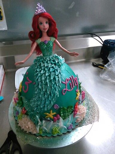 Ariel doll cake Doll Cake Buttercream, Ariel Doll Cake, Princess Doll Cake, Barbie Doll Birthday Cake, Ariel Cake, Ariel Birthday Party, Doll Birthday Cake, Little Mermaid Cakes, Ariel Doll