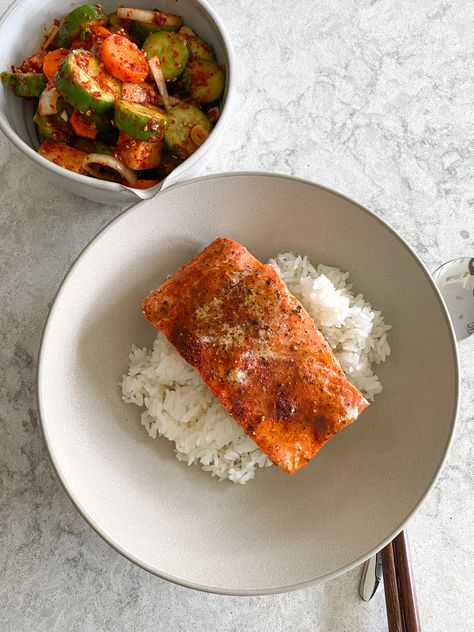 Salmon Rice Bowl with Cucumber Kimchi. If you've seen the viral salmon rice bowl on TikTok, this is my Korean version. Salmon And Rice Aesthetic, Veggie Salmon Bowl, Kimchi With Rice, Rice Cucumber Bowl, Salmon And Rice Dinner, Sushi Bowl Salmon, Salmon Bites Bowl, Korean Healthy Food, Salmon Kimchi