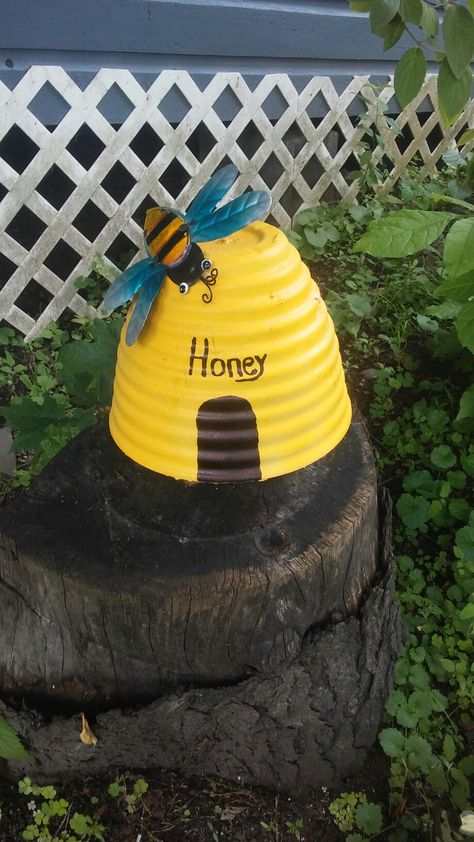 ~ Bee hive garden decor made from dollar store planter ~ diy ~ garden decor ~ spring/summer ~ dollar store crafts ~ whimsical~  bee decor ~ Clay Pot Bee Hive, Bee Yard, Flower Garden Decorations, Bee Craft, Bee Stuff, Bee Friendly Garden, April Crafts, Planter Diy, Honey Bee Decor