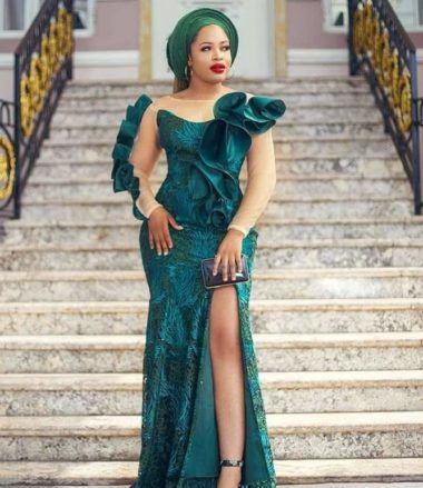 67 Beautiful And Trendy Lace Gown Styles (Updated) | ThriveNaija Lace Asoebi Styles, Lace Styles For Wedding, Aso Ebi Dresses, Aso Ebi Lace Styles, African Party Dresses, Nigerian Lace Styles, African Lace Styles, Simple Gowns, Lace Gown Styles