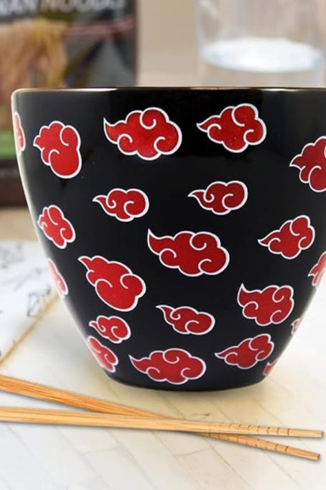 "Elevate your dining experience with the JUST FUNKY Naruto Shippuden Ramen Bowl! 🍜 Featuring the iconic Akatsuki Cloud Symbol and paired with Anime Chopsticks, this 16 oz Ceramic Soup Mug is a must-have for Naruto fans. Upgrade your kitchen decor with this officially licensed masterpiece. Get yours now! 🥢🍥 #NarutoRamenBowl #Akatsuki #AnimeKitchen" Anime Chopsticks, Anime Pottery, Ramen Bowl Ceramic, Naruto Ichiraku Ramen, Cloud Symbol, Ichiraku Ramen Shop, Ceramic Ramen Bowl, Akatsuki Cloud, Ichiraku Ramen