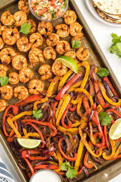 Sheet Pan Shrimp Fajitas in baking sheet. Fajita Sheet Pan, Easy Shrimp Fajitas, Fajita Seasoning Recipe, Fajita Mix, Sheet Pan Shrimp, Pan Shrimp, Mom On Timeout, Homemade Fajita Seasoning, Shrimp Fajitas