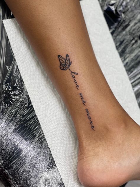 Spine Tattoos For Women Quotes Butterfly, Butterfly Tattoo Words, Birth Year Tattoo Ideas Ankle With Butterfly, Tattoo Quotes With Butterflies, Word Tattoos With Butterflies, Butterfly Tattoos With Words, Butterfly Script Tattoo, Quote And Butterfly Tattoo, Word And Butterfly Tattoo