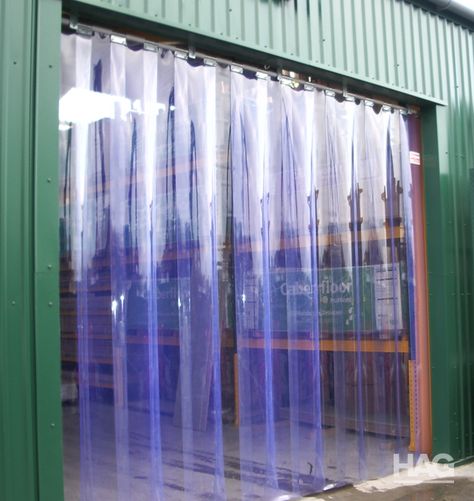 Durable PVC strip curtain fixed overhead to allow for quick entrances and exits in busy industry premises. Clear PVC strip curtains allow for through vision while offering a level of thermal protection. #doors #speeddoors #thermaldoors #thedoorspecialists Strip Curtains, Door Stripping, Plastic Curtains, Cute Curtains, Plain Curtains, Door Insulation, Farm Buildings, External Doors, Door Kits