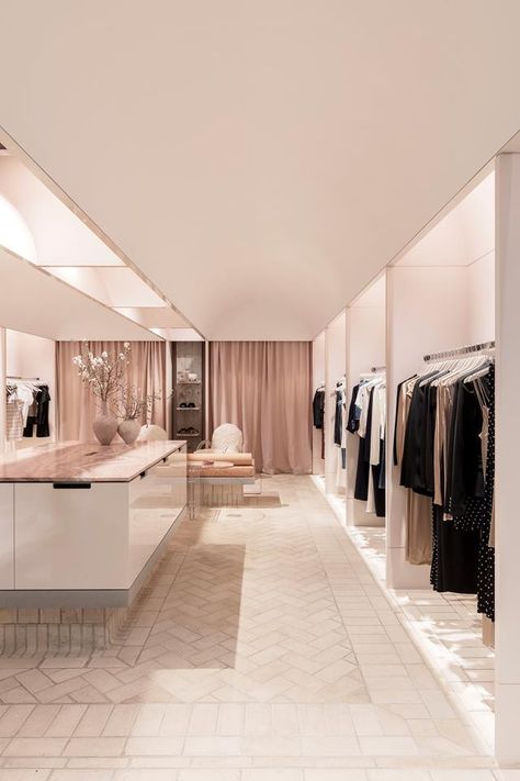 At the Bec + Bridge flagship store in Sydney's Bondi Junction, beachy tones have been incorporated into the interior design. The floor is made from bricks laid in a herringbone pattern, while architect George Livissianis lowered the ceiling in order to create barrel vaulting | Photography: Tom Ferguson Bridal Boutique Interior, Butik Design, Display Visual Merchandising, Fashion Store Design, Vitrine Design, A Clothing Store, Clothing Store Interior, Clothing Store Design, Store Design Boutique