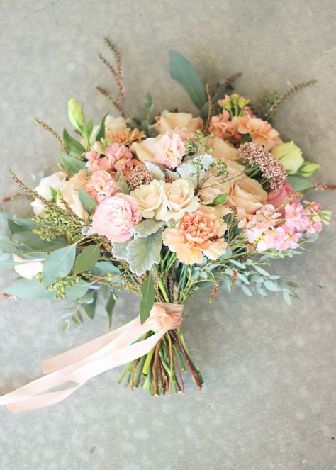 Bridal Bouquet: Peach carnations, quicksand roses, white majolica spray roses, lisianthus, peach stock, calcynia, gunni eucalyptus, seeded eucalyptus //Celebration Flair Quicksand Rose Wedding, Peach Carnations, Wedding Flower Arrangements Fall, Wedding Flowers Purple, Quicksand Rose, Bridal Bouquet Peach, Peach Bouquet, Wedding Flowers Hydrangea, Lavender Wedding Flowers