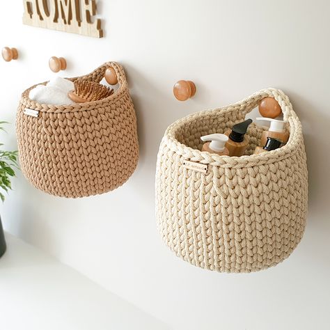 Introducing our beautiful hanging wall basket! This unique crochet basket is the perfect addition to your home decor. Hang it on any wall for an instant upgrade to your space.

#crochethangingbasket #wallbasket #hanging basket #hanging walldecor Cute Cottagecore Room Decor, Hanging Baskets Nursery, Crochet Wall Decoration, Nursery Crochet Ideas, Nursery Wall Storage, Crochet Hanging Baskets, Crochet Hanging Basket, Crochet Storage Basket, Hanging Basket Storage