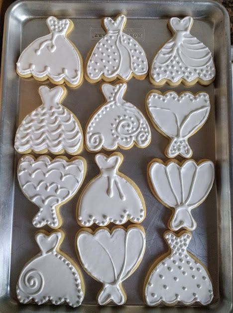 iced wedding dress sugar cookies Royal Icing Wedding Dress Cookies, Bridal Decorated Cookies, Wedding Dress Shopping Cookies, Wedding Iced Cookies, Royal Iced Wedding Cookies, Wedding Dress Sugar Cookies Decorated, Wedding Sugar Cookies Simple, Wedding Cake Sugar Cookies, Wedding Cutout Cookies