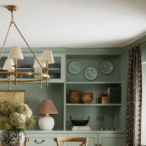 Farrington Lane on Instagram: "Things are winding down here for our Christmas and New Year closure. Before we go, here is a traditional dining room we wrapped up this year for one of our Northwest Hills projects. We added the custom built-in cabinetry, swathed the room in a calming blue-green, and used @lisafinetextiles to frame the existing windows in custom draperies (or curtains 😉 @amityworrelco). Our client had some of the perfect vintage and antique tabletop to showcase here, and we added in a few new pieces as well. We particularly love the barely there blue plates on the top shelf!  Photo by @jeff_jones_photo" Coastal Grandmother Dining Room, Green Waynes Coating, Blue Green Dining Room, Waynes Coating, Dining Room Built Ins, Dining Room Built In, Jeff Jones, Green Dining Room, Traditional Dining